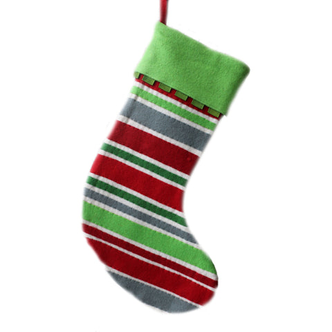 Holiday striped stocking with ribbon accent