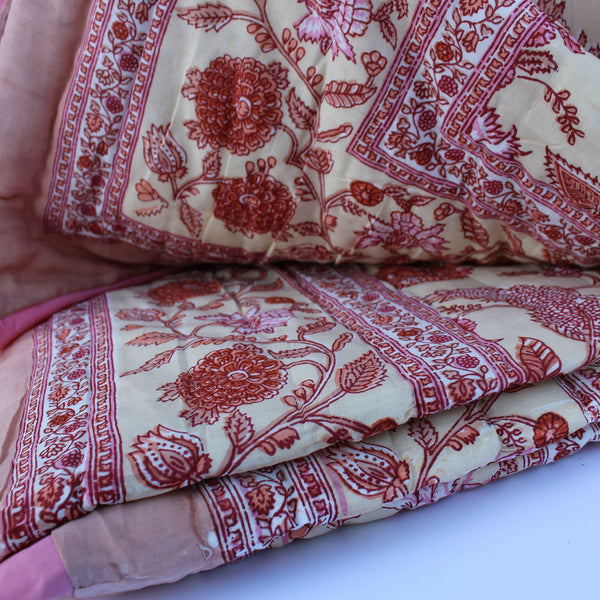 cream and pink wood block Indian quilt