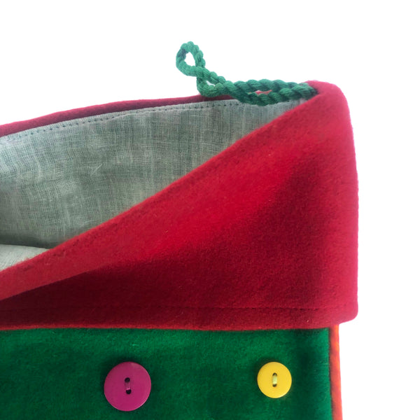 Buttons on green felt Christmas stocking